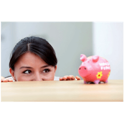 woman watching a pink piggy bank
